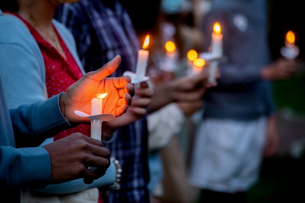 4-20-21-vigil-for-the-victims-of-gun-violence-college-green-candle-mask