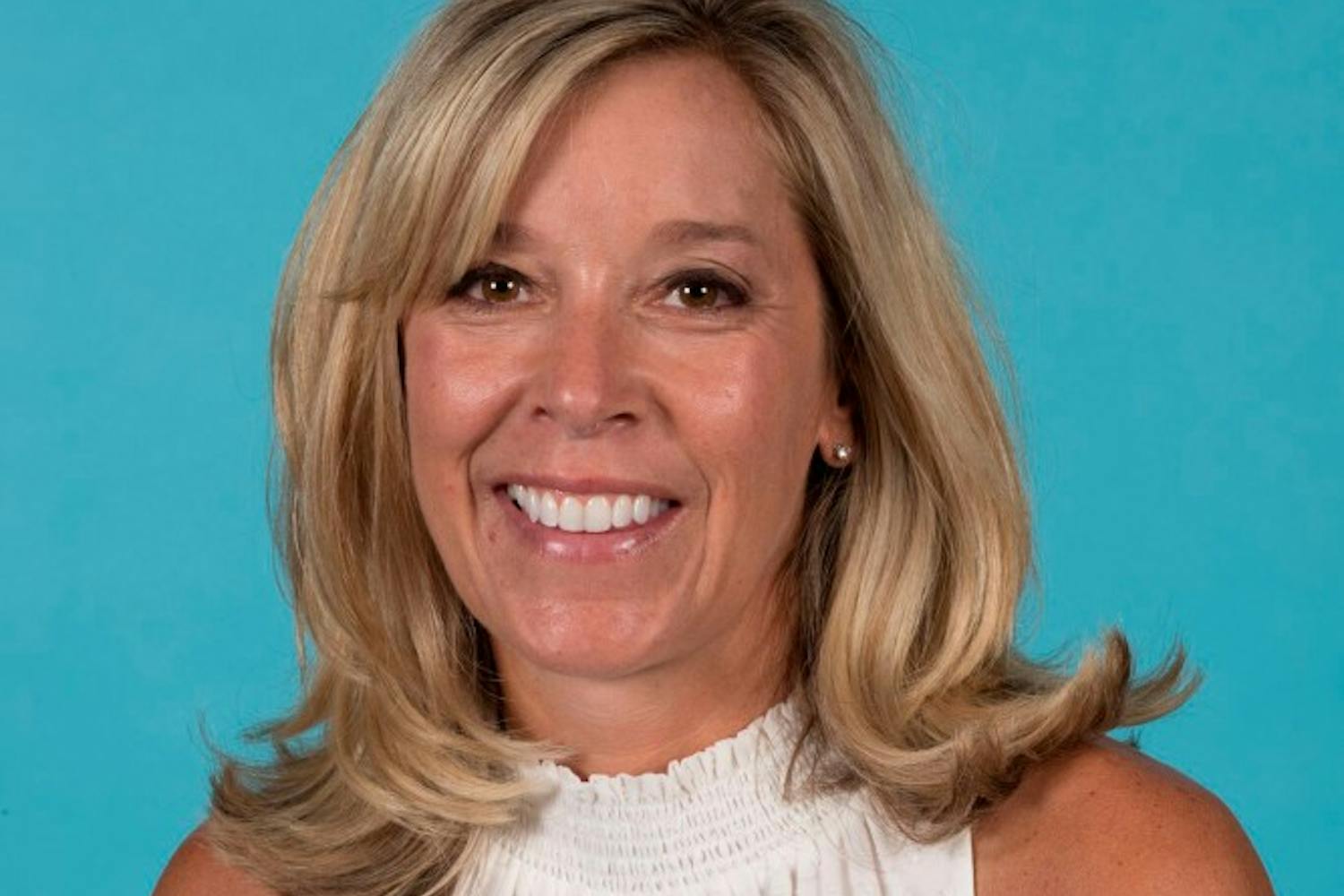 After stints with Air Force Academy, George Mason, Georgetown and James Madison, coach Juli Benson joins the Red and Blue staff.