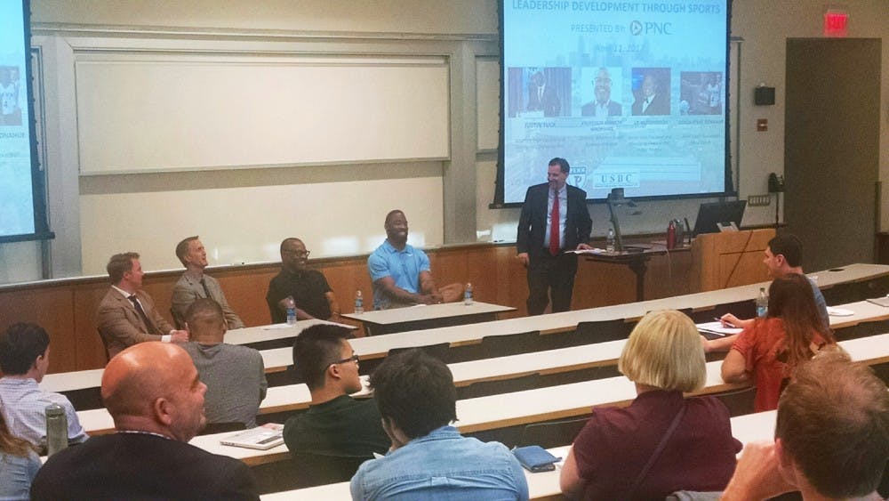 Former NFL star and current Wharton MBA student Justin Tuck (seated, right) headlined a panel which also featured Penn men's basketball coach Steve Donahue, among others. The panel was hosted by the Undergraduate Sports Business Club.