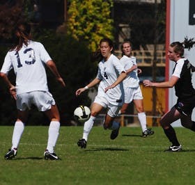 Quakers cut it close in wins