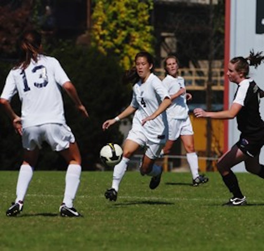 Quakers cut it close in wins