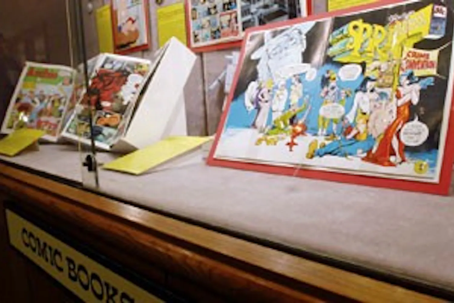 Superheroes take flight between the stacks