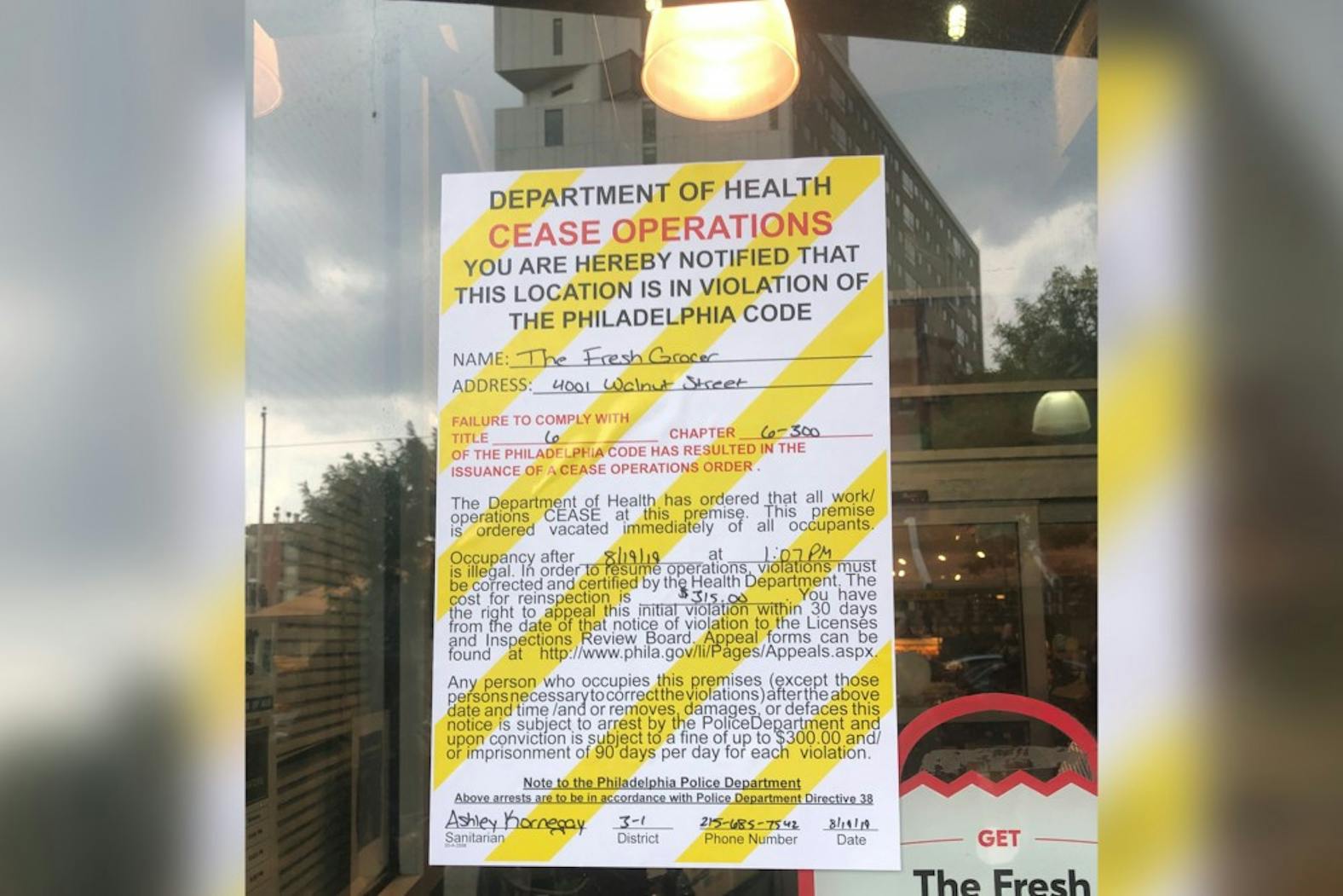Fresh Grocer Health Violations Sign.jpg