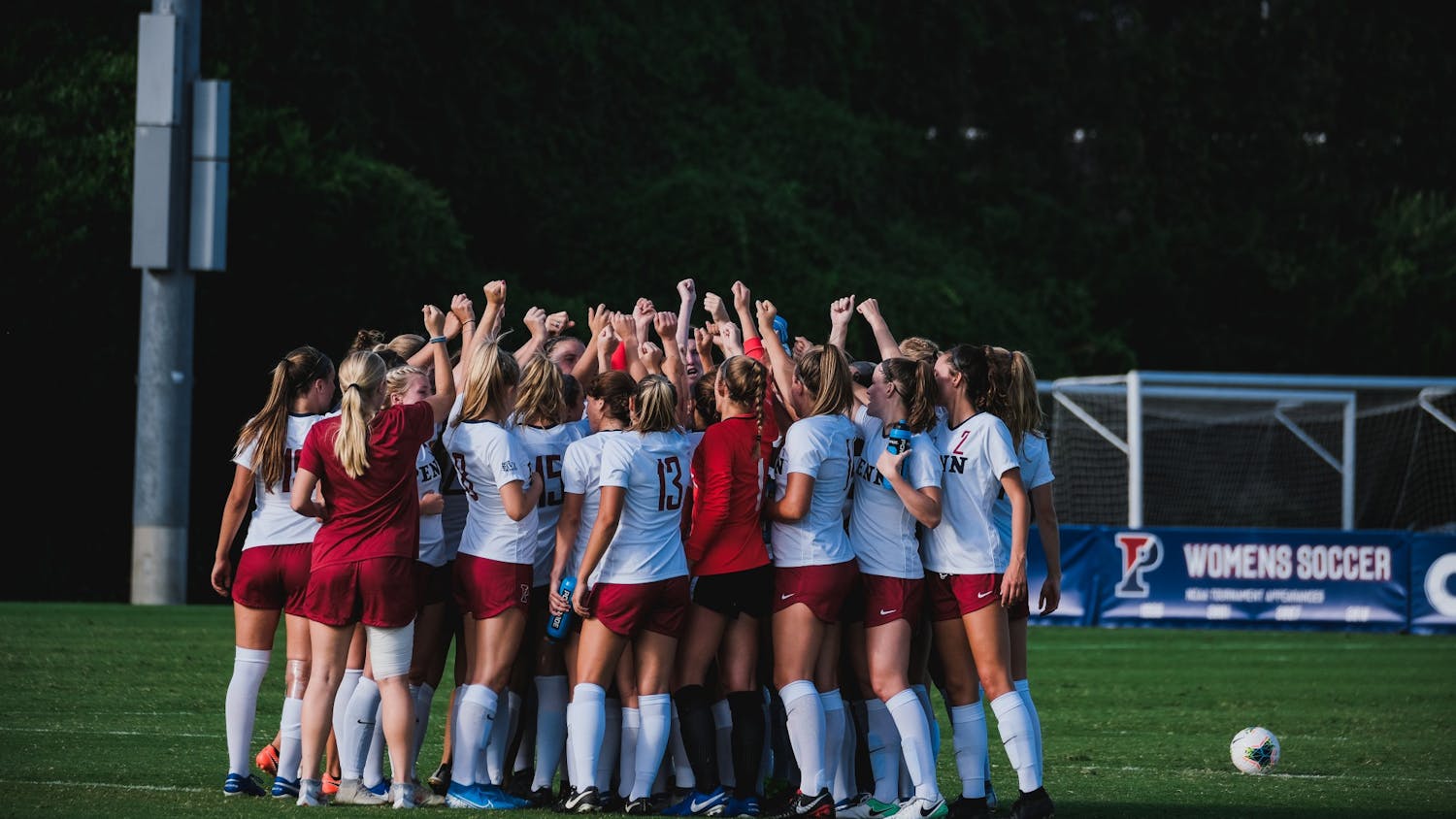 womens soccer huddle.jpg
