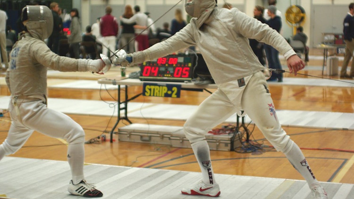 Using a strategy created with the help of senior Evan Prochniak and coach Andy Ma, junior Michael Mills defeated Penn State’s Shaul Gordon to claim the national title in sabre.