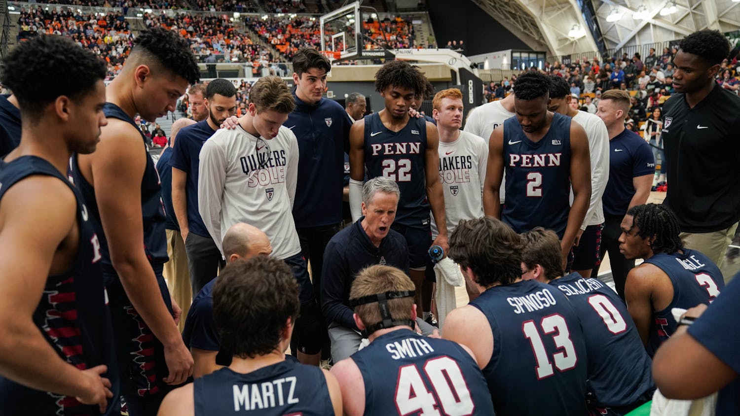03-11-23 Men's Basketball vs Princeton Team Huddle (Anna Vazhaeparambil).jpeg