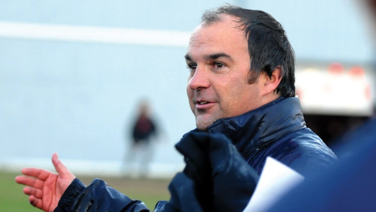Men's soccer plays Harvard for the Ivy League title and comes out victorious.
A wet Rudy Fuller congratulates his Ivy championship team