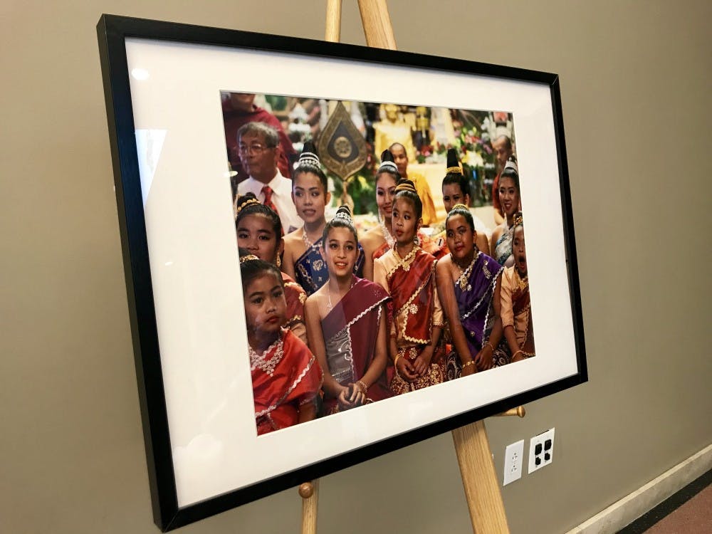 Catzie _the many faces of a Lao New Year Princess penn law refugee art project