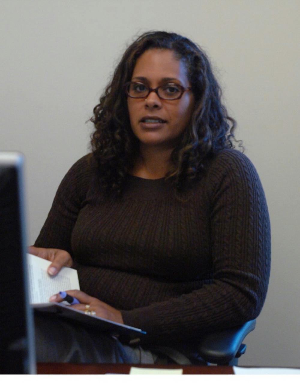 Professor Camille Charles sitting at her desk