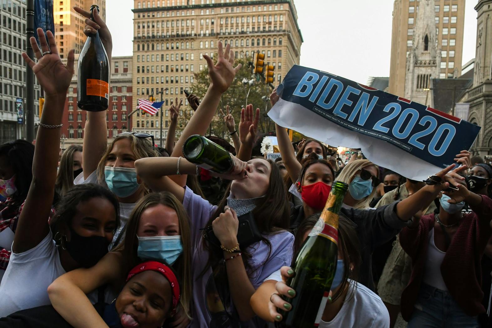 11-07-20 Penn and Philadelphia Celebrates Joe Biden Elected President of the United States Girls Cheering Drinking and Biden 2020_.jpg