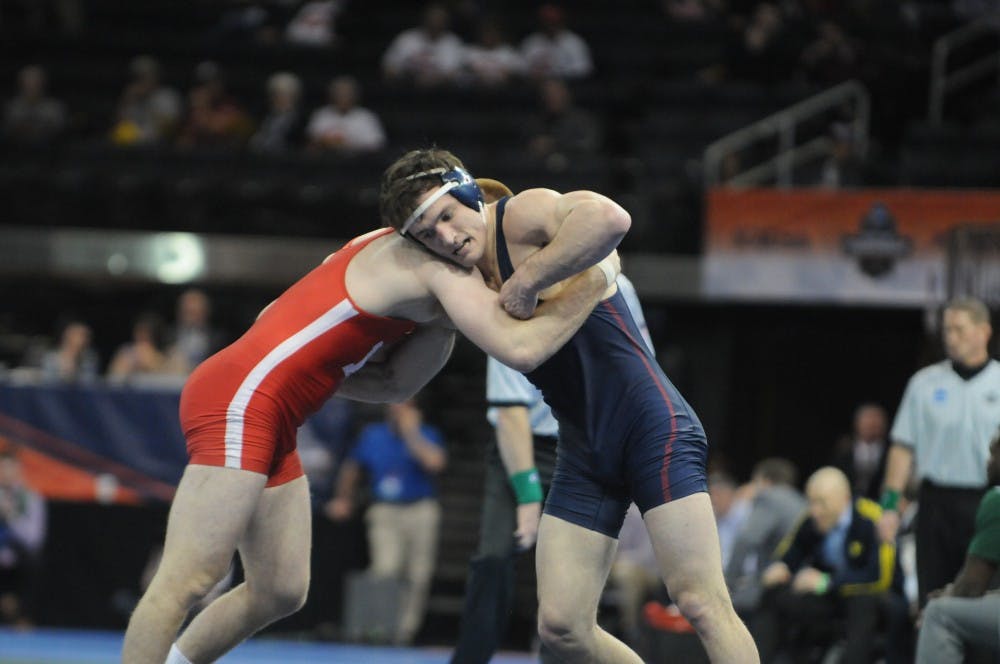 Senior 174-pounder Casey Kent secured All-American status on Friday with a pin of Oklahoma's Max Reed. Saturday, he looks to fight his way to third in the NCAA.
