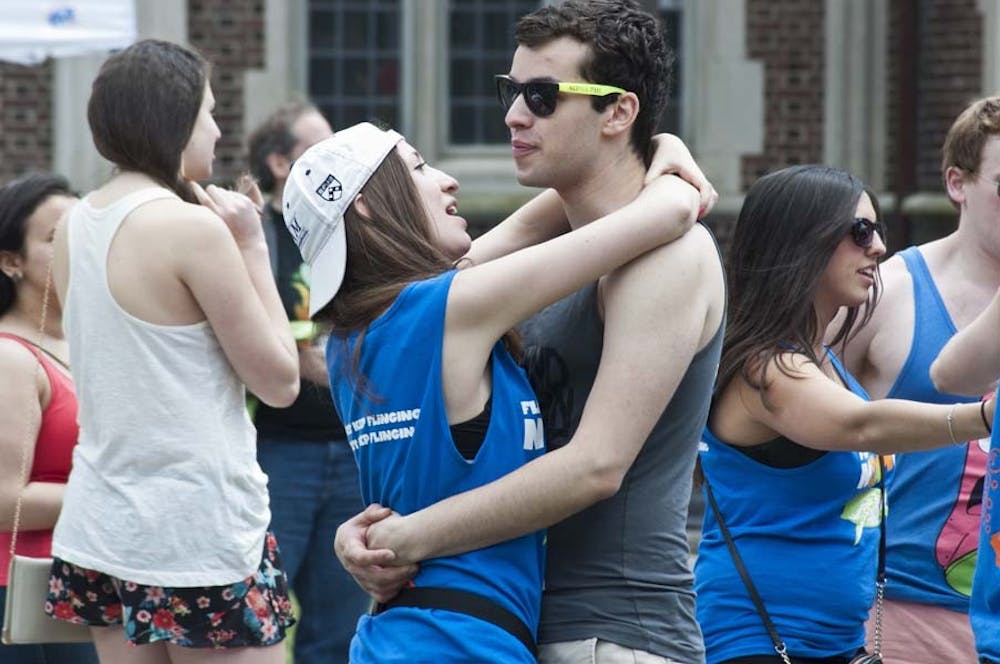 Images for the Photo Essay.

During Fling, two ideas crystallized for potential photo essays:  1) Portraits of fling shirts that highlight the many student organizations around campus.  2)  Capturing intimate moments of people embracing.