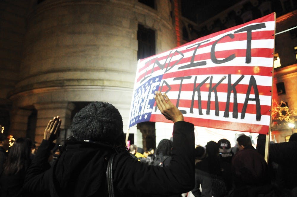 Protestors held a die-in protest inside 30th Street Station before marching to CIty Hall in protest of the Ferguson decision