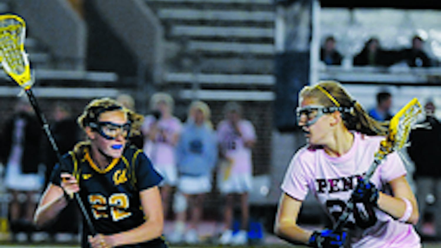 W. Lax dominates despite injury