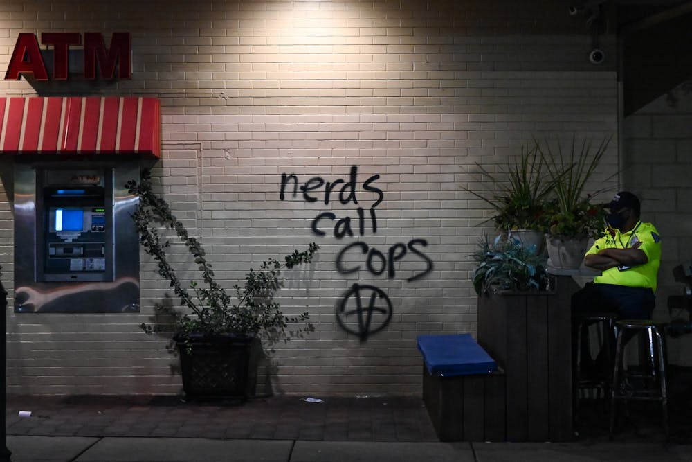 civil-unrest-allegros-pizza-graffiti-nerds-call-cops-anticapitalist