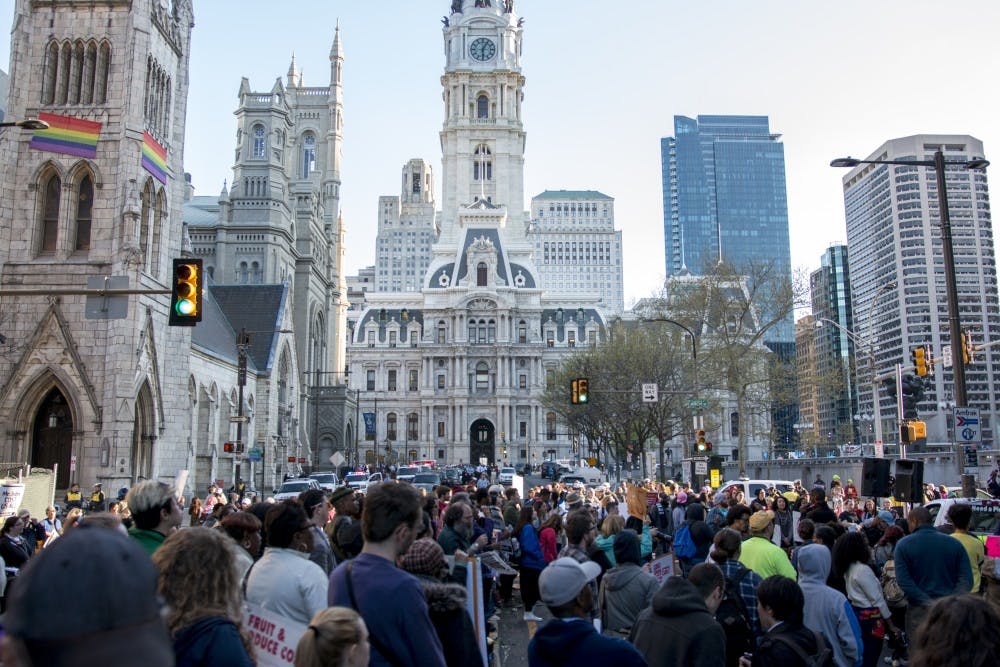 Some of the protestors against Temple University's proposed stadium stopped at City Hall and joined a protest for a $15 minimum wage outside of the McDonalds on Broad Street. 