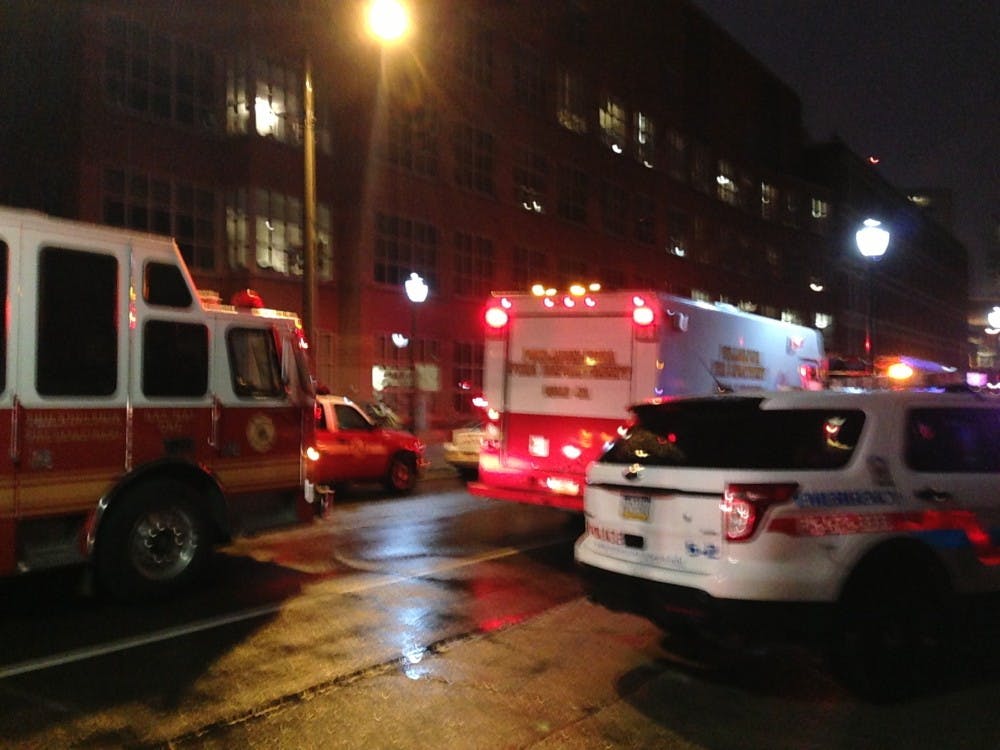	Emergency vehicles park outside Vagelos Labs, where a Haz Mat incident occured this morning.