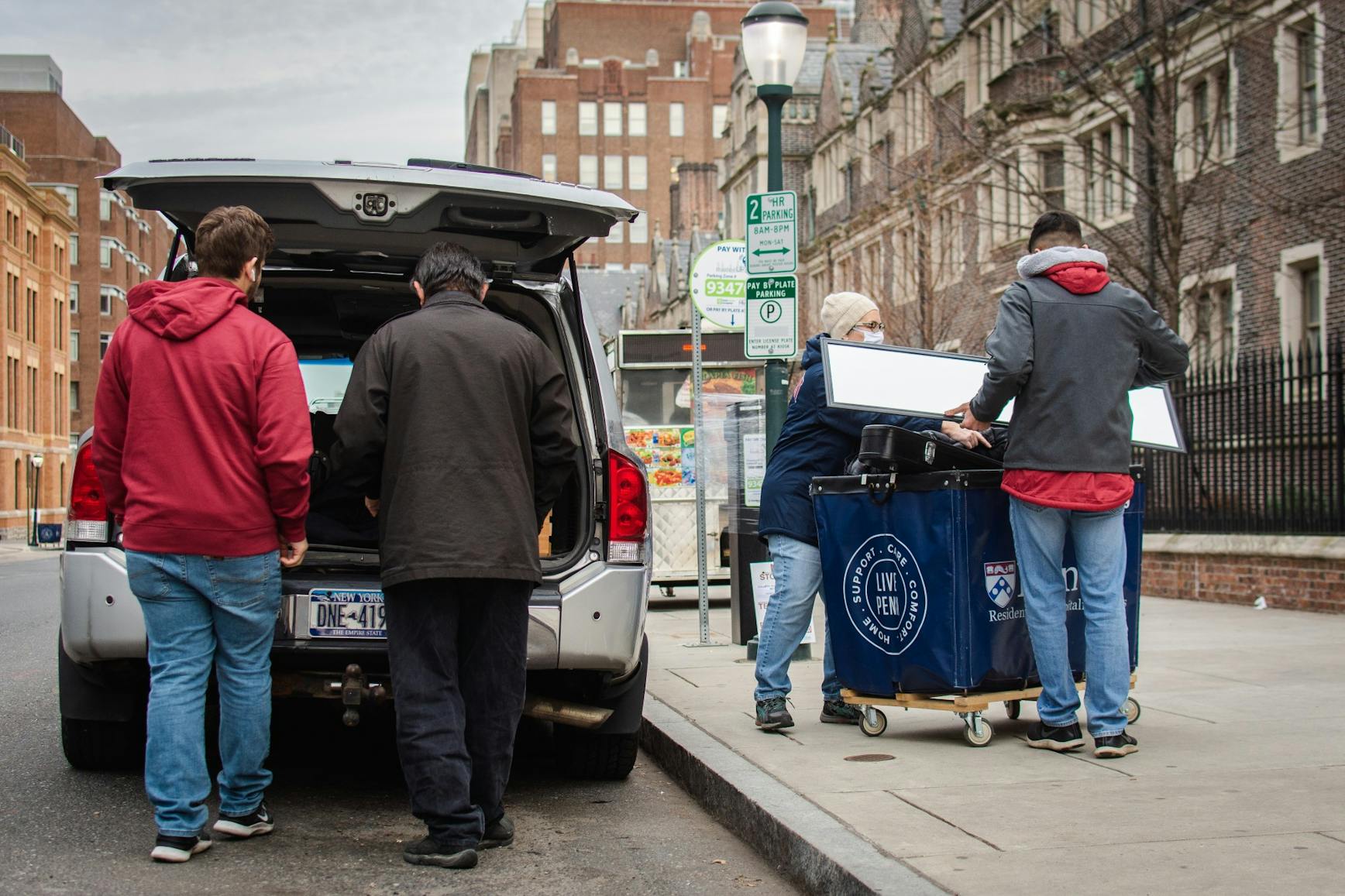 Move-In 2021 Family Unpacking Car Behind.jpg