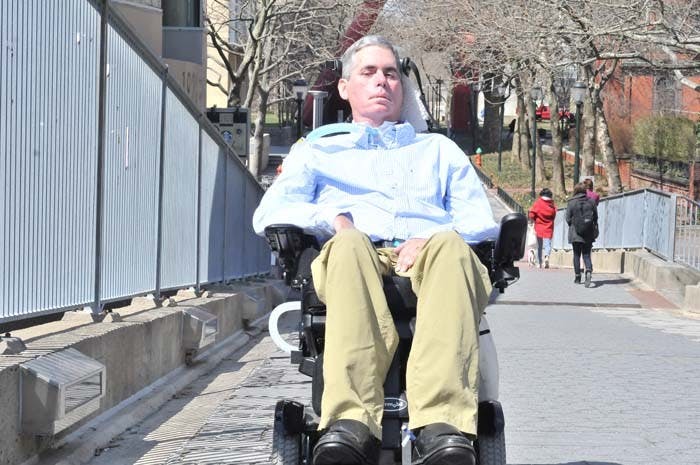 Profile of Scott Mackler, a researcher at Penn who has ALS (Lou Gehrig's Disease) and is unable to move any part of his body