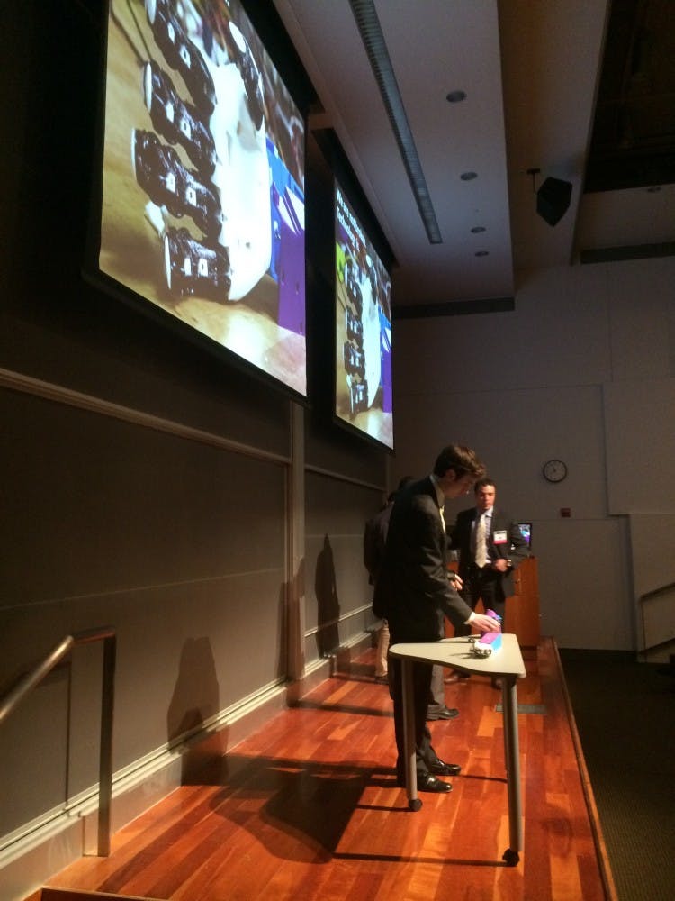 Team members from BionUX, a new model for a prosthetic arm, answered audience questions after their presentation. 
