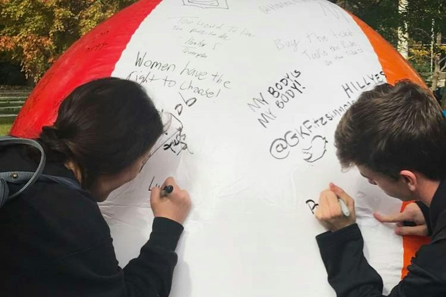 In a free speech demonstration by the Statesman last year, students were invited to write on a beach ball. 