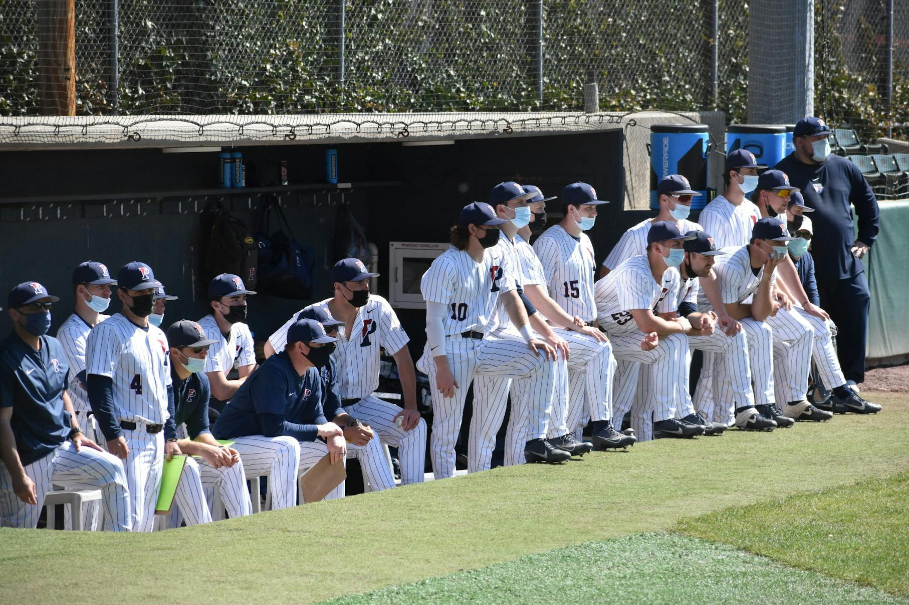 3-27-2021 Baseball vs Villanova Dugout with masks (Samantha Turner).jpg