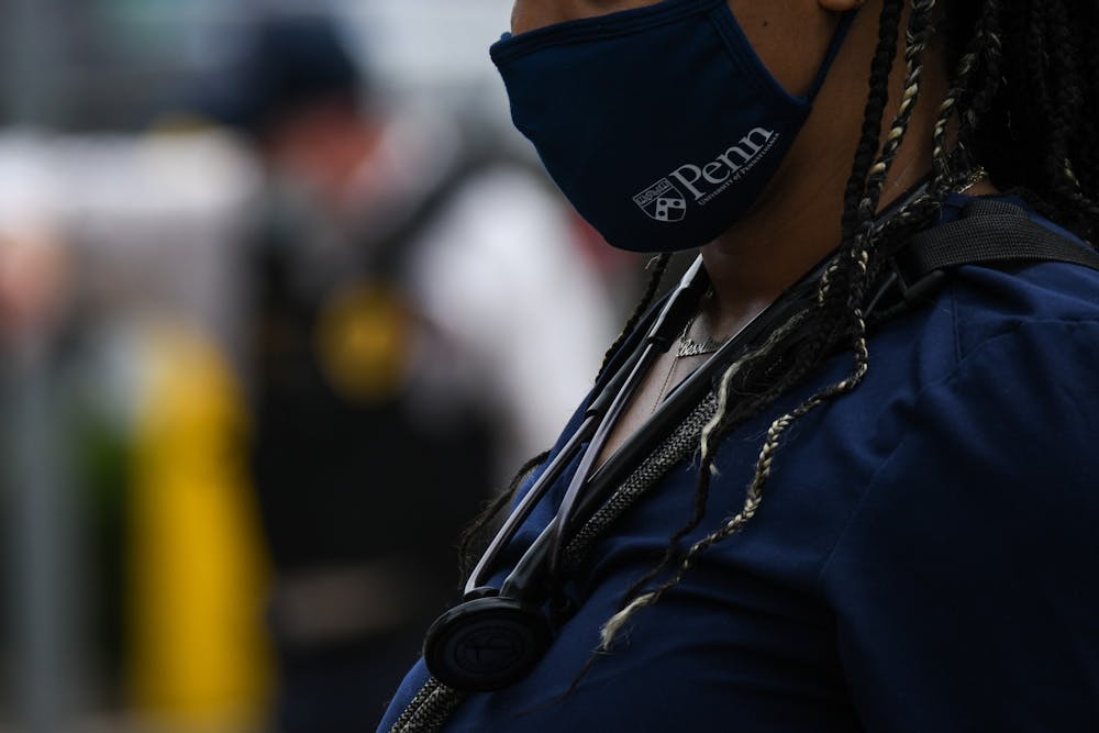 07-24-20-police-free-penn-protest-coronavirus-mask