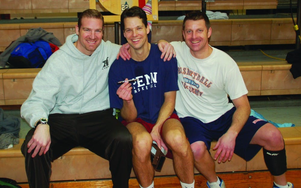 	Former Penn basketball three-point specialist Scott Kegler (center) has coordinated Saturday morning pickup hoops sessions at the Palestra for over a decade. Andy Baratta (left) has also coordinated the games in the past. Michael Root (right) is one of many participants in the tradition, which dates back to 1989.