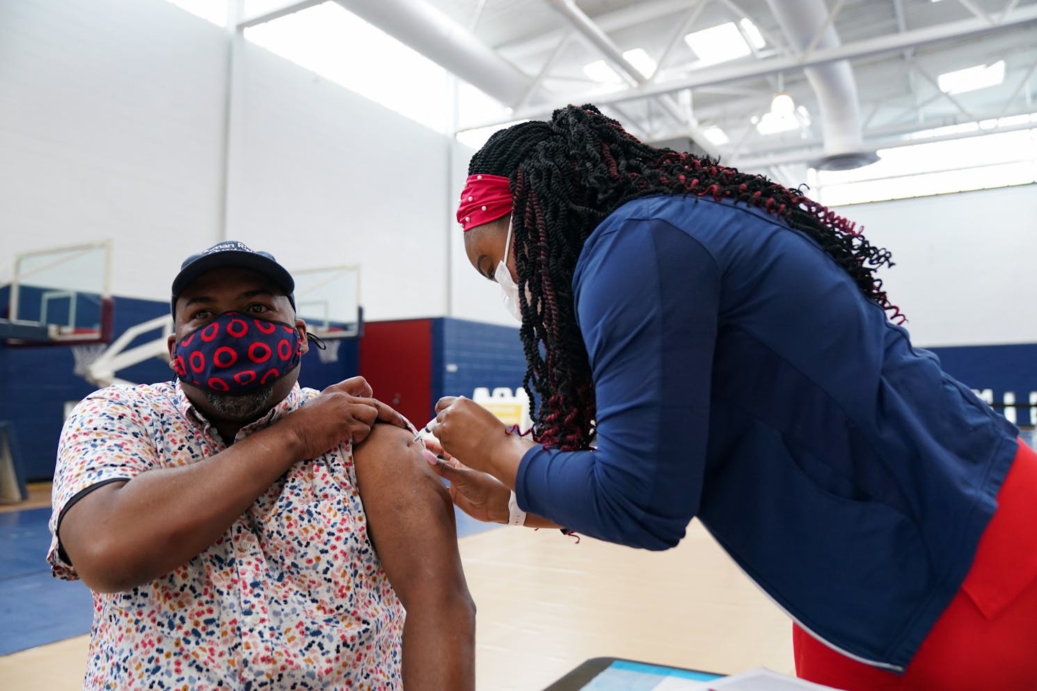 04-14-21 Penn Vaccination Site Covid-19 Vaccine Nurse Patient.jpg