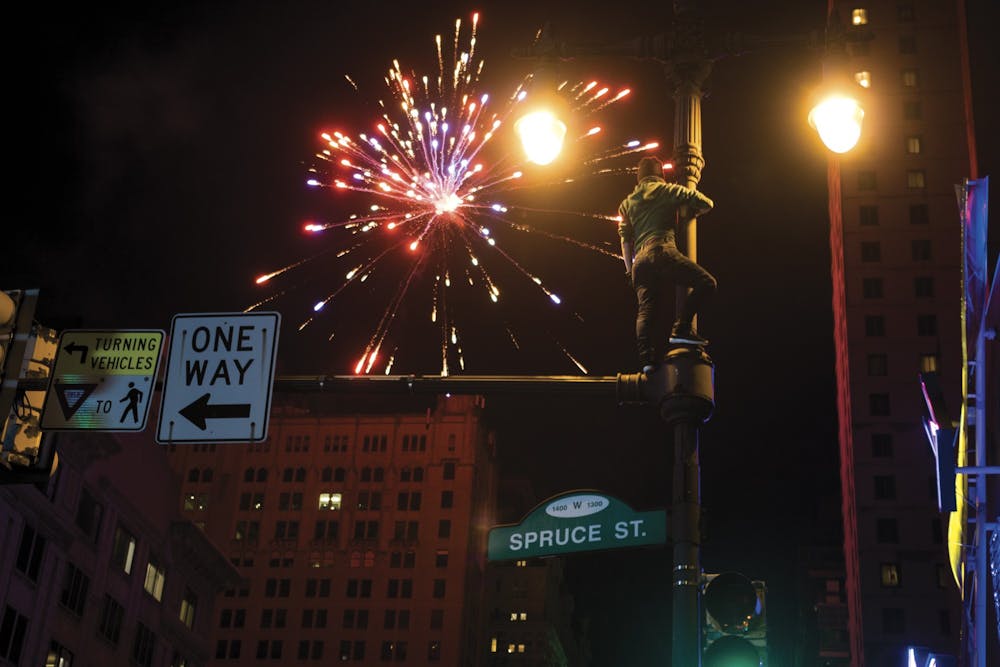 Philadelphia Eagles Fans Climb City's Greased Poles to Celebrate Win