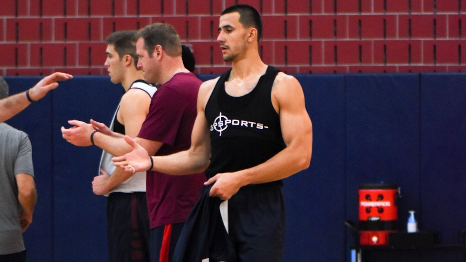 During practice, sophomore Mike Auger and his teammates wear vests from GPSports underneath their practice jerseys.