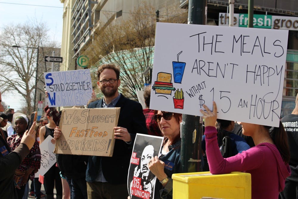 A walkout was held Wednesday for the "Fight for $15" campaign, bringing together an estimated 3,000 students from Drexel, Penn, Temple and other colleges as they marched from McDonalds to the Market Street Bridge.