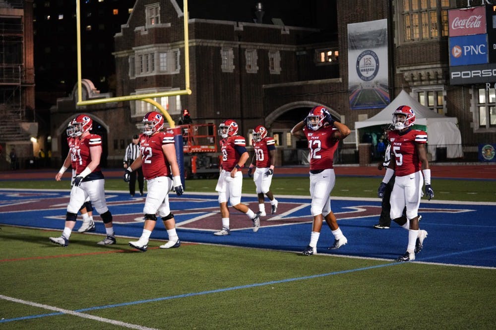 football-vs-dartmouth-team-walkon-endzone