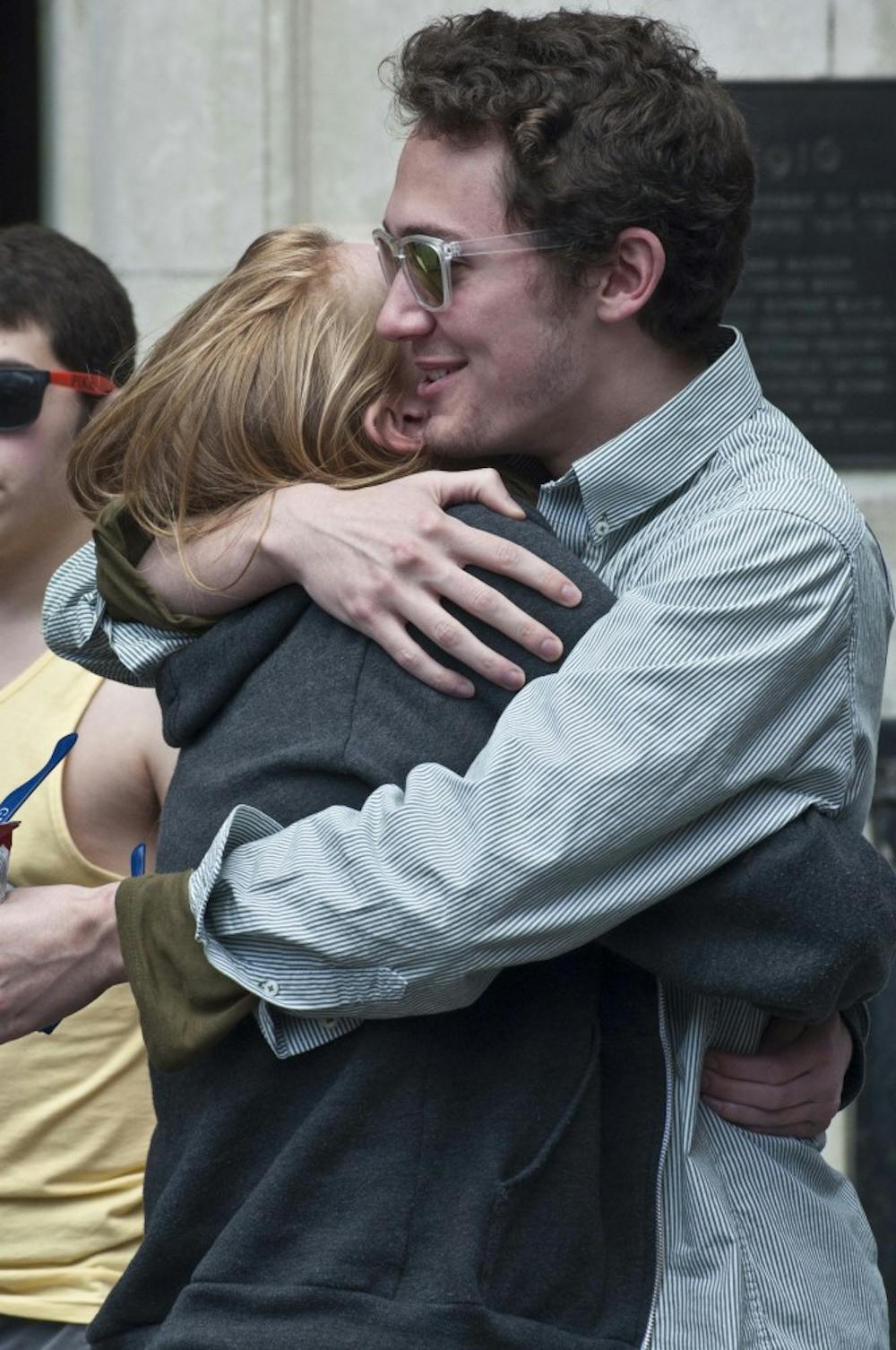 Images for the Photo Essay.

During Fling, two ideas crystallized for potential photo essays:  1) Portraits of fling shirts that highlight the many student organizations around campus.  2)  Capturing intimate moments of people embracing.