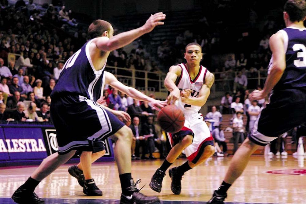 Ibrahim Jaaber makes a pass after bringing the ball down court.