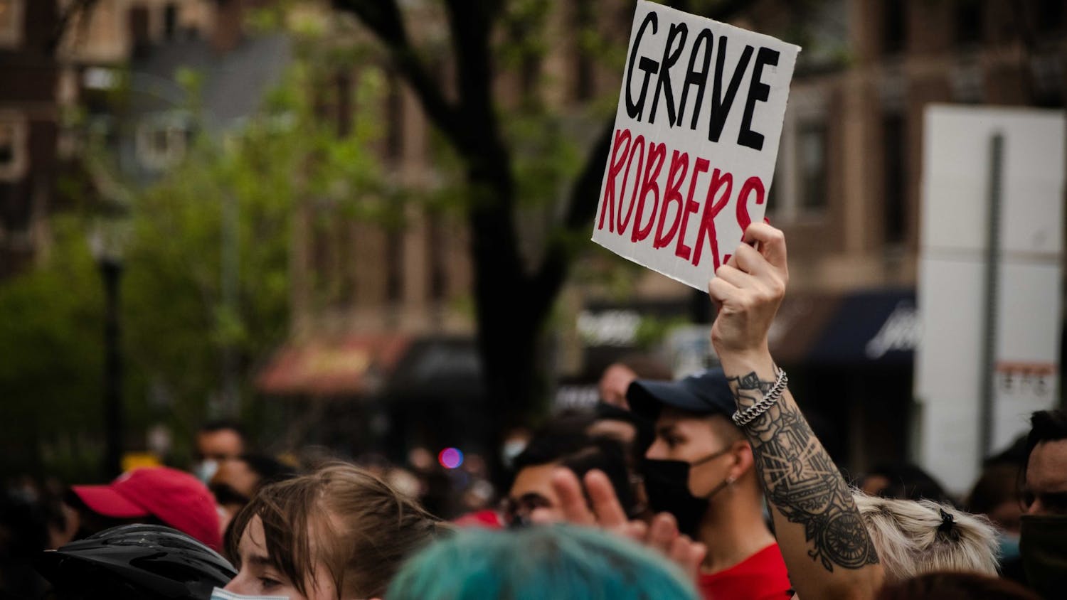 04-28-21 MOVE protest Grave Robbers Sign (Max Mester)