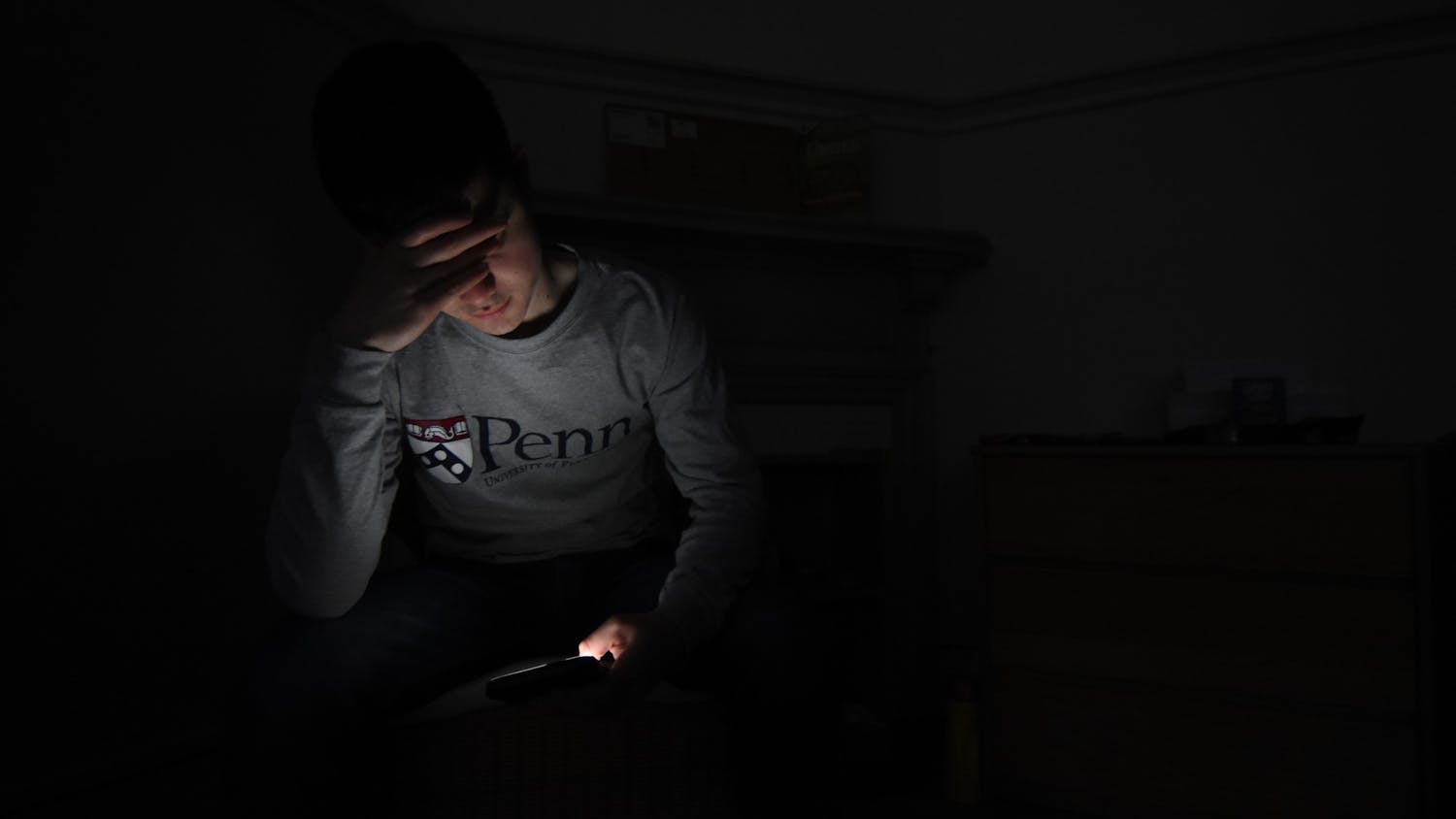 03-05-21 mental health stressed student in the dark (Diego Cardenas Uribe).jpg