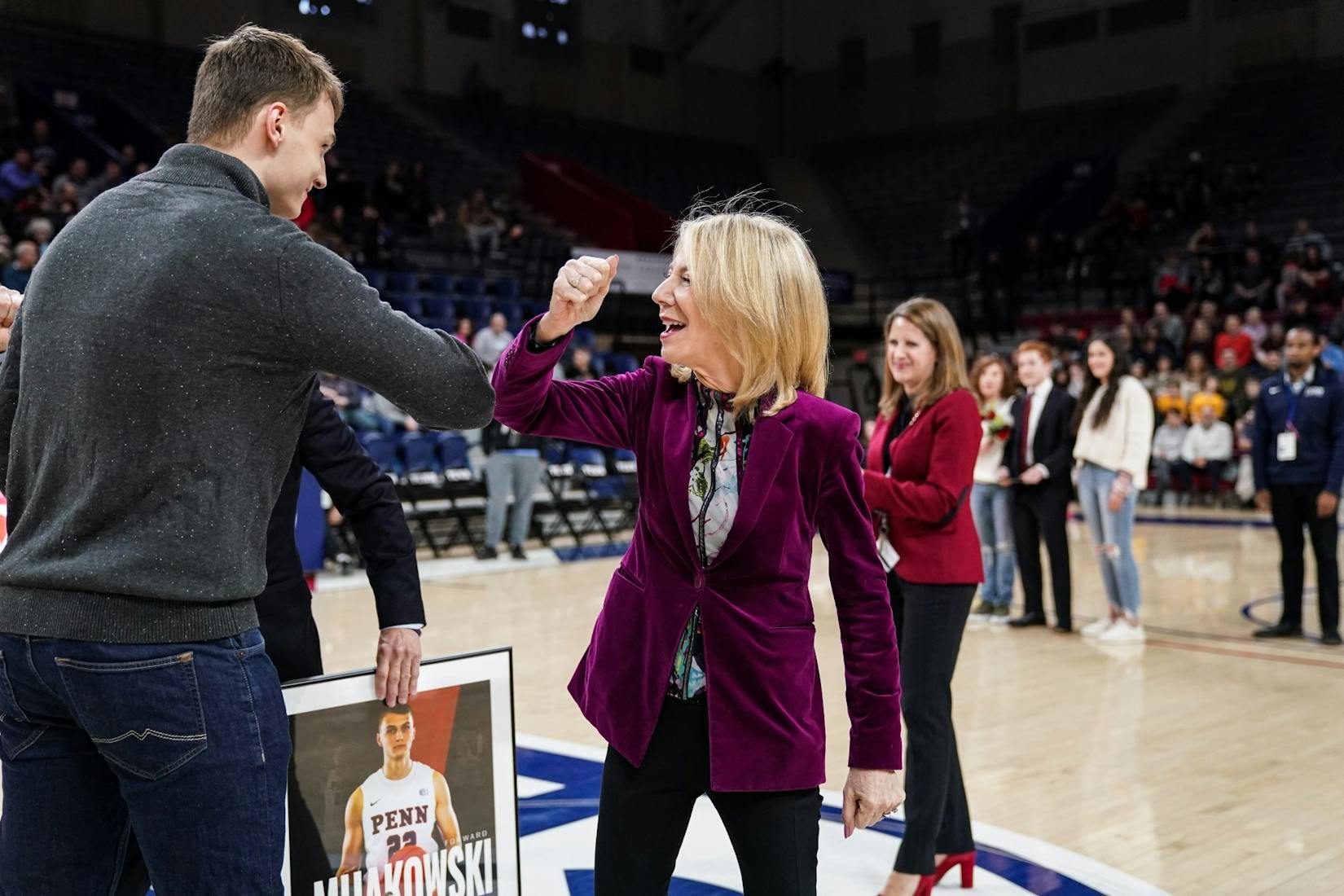 03-31-20 Amy Gutmann elbow bumping (Chase Sutton).jpg