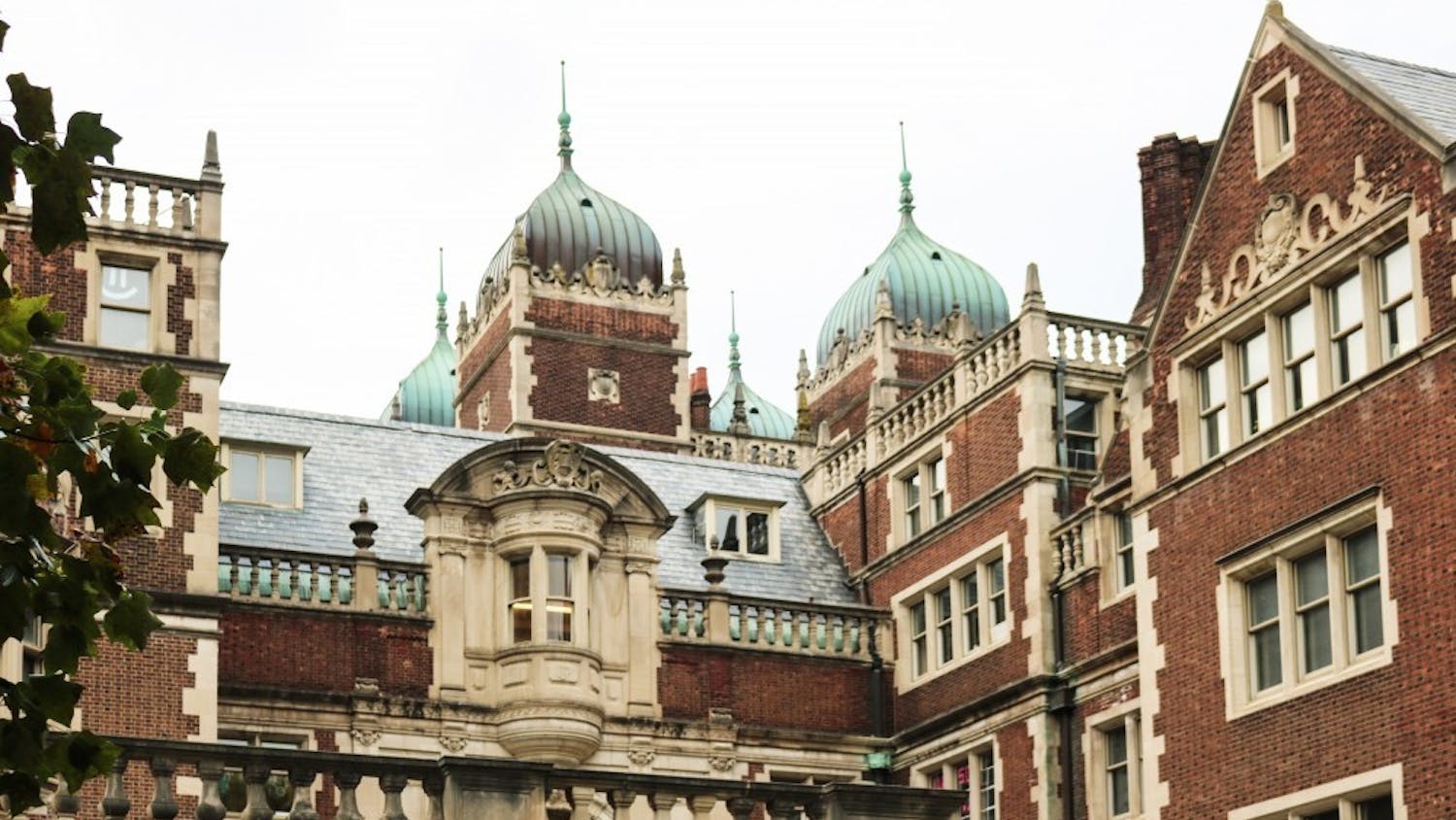 A student reported her coat and purse missing from her room in the Quad, but there were no signs of forced entry.