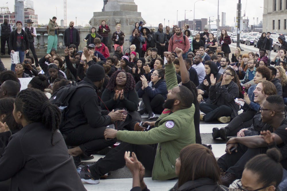 Students perform a sit-in near 30th Street Station.
