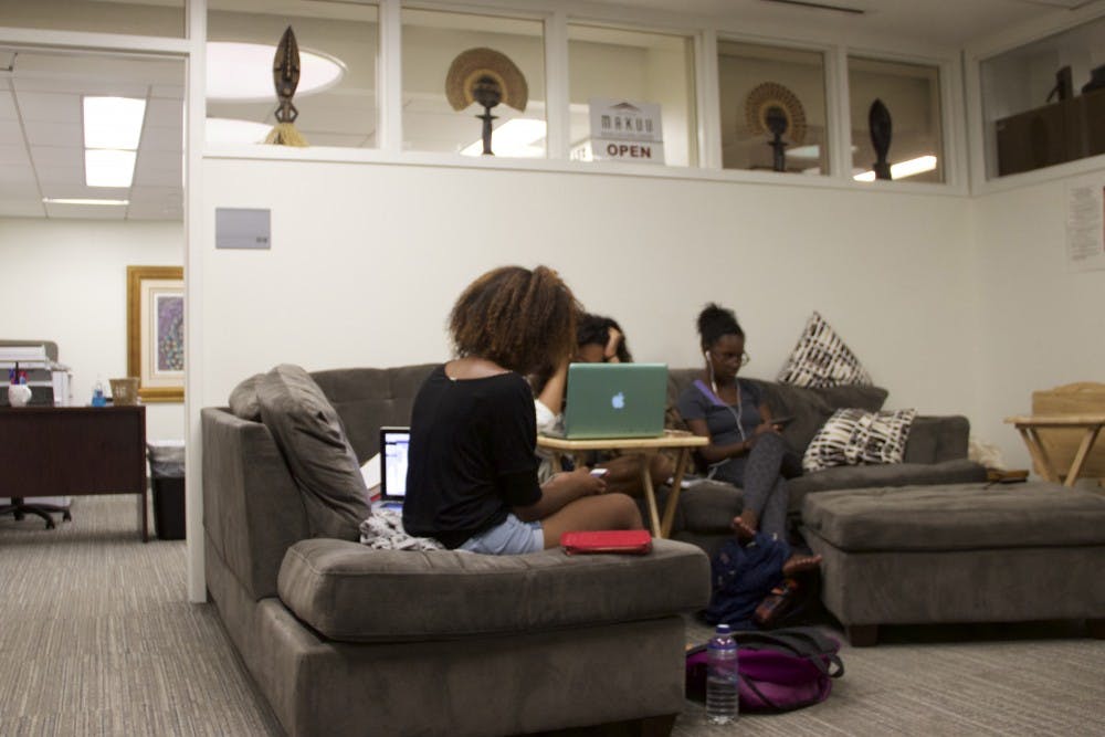 Students study on the sofa in MAKUU, one of many cultural centers on Penn's campus.