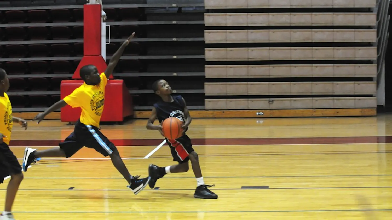 Cops and kids make PALs on court