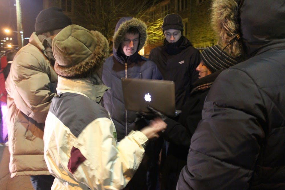 Penn Alexander protest, people lined up, closing, school, parents, petitions