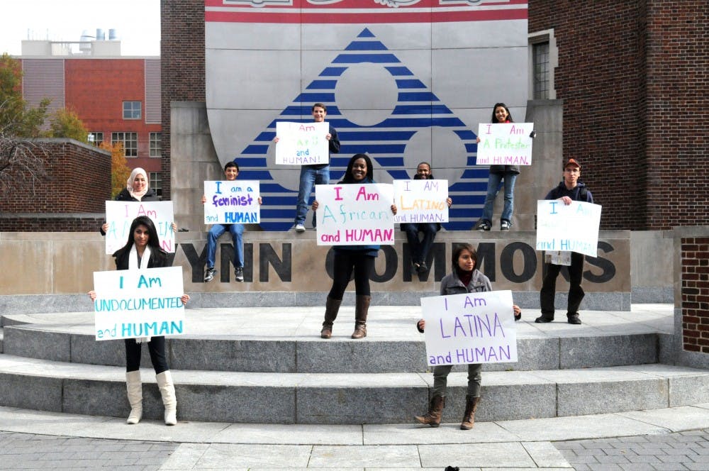 Penn for Immigrant Rights and Penn Political Coalition's I Am A Human Demonstration

Gionni Ponce '15 (hat)
Tania Chairez '14 (white boots)
Angel Contrera '13 (black jacket blue hood)
Abraham Moller '15 (A's hat)
Iris Mayoral '15 (I am Latina sign)
Afnaan Moharram '14 (tan headscarf)
Ibi Etomi '14 (turquoise)
Ricky Swieton '14 (Penn shirt)
Jose Gonzales '14 (grey sweatshirt)