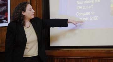 Prof discusses debt-relief programs
