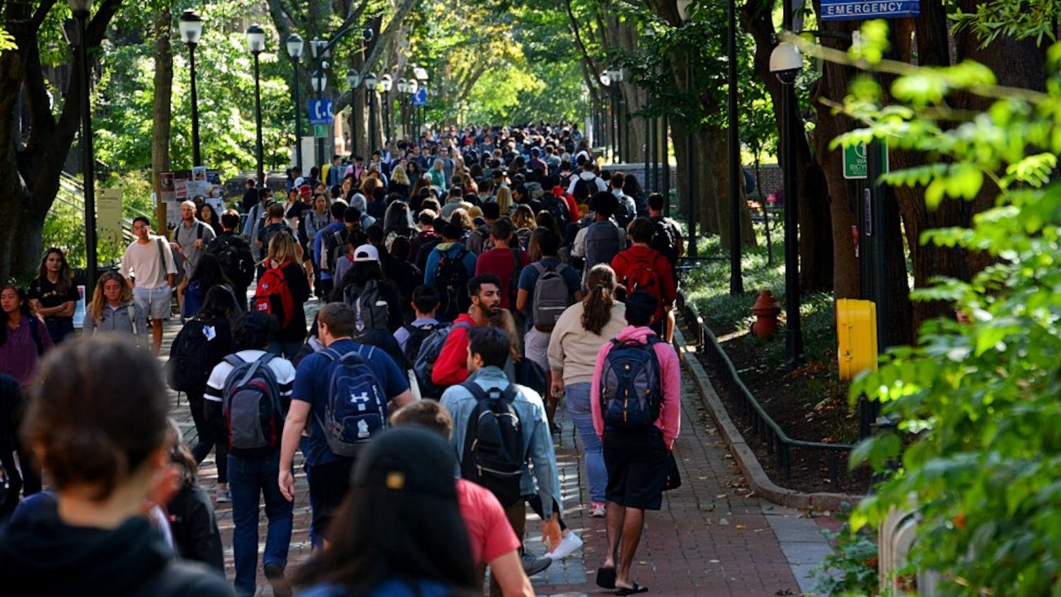 students walking down locust in between classes