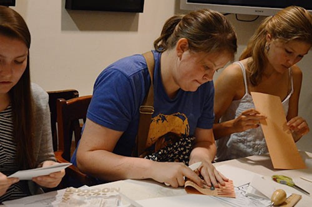 On Wednesday night, the Kelly Writer's House hosted a Bookbinding Workshop lead by Henry Steinberg,a 2013 College graduate. Participants learned the art of bookingbinding from Steinberg and his 