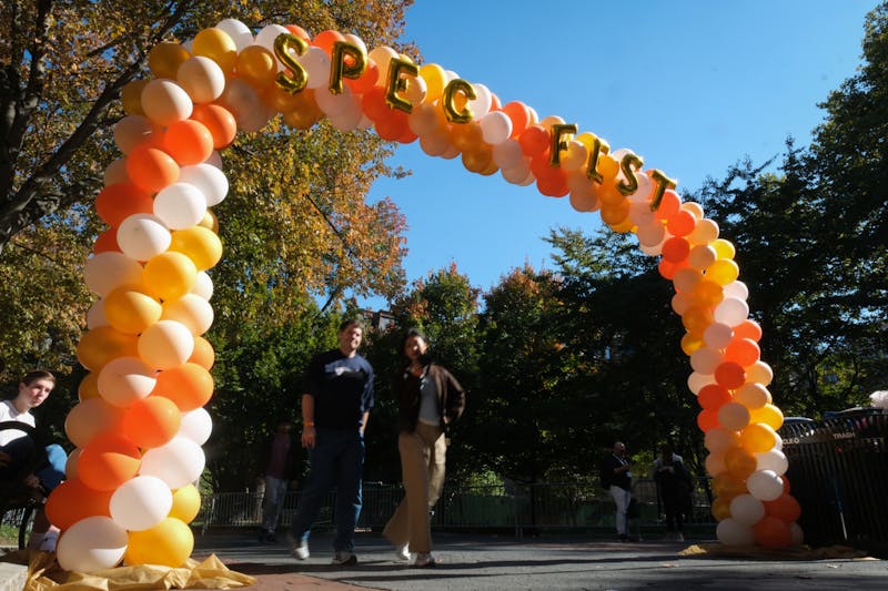 SPEC hosts fall-themed festival on College Green with axe throwing, pumpkin decorating, free food