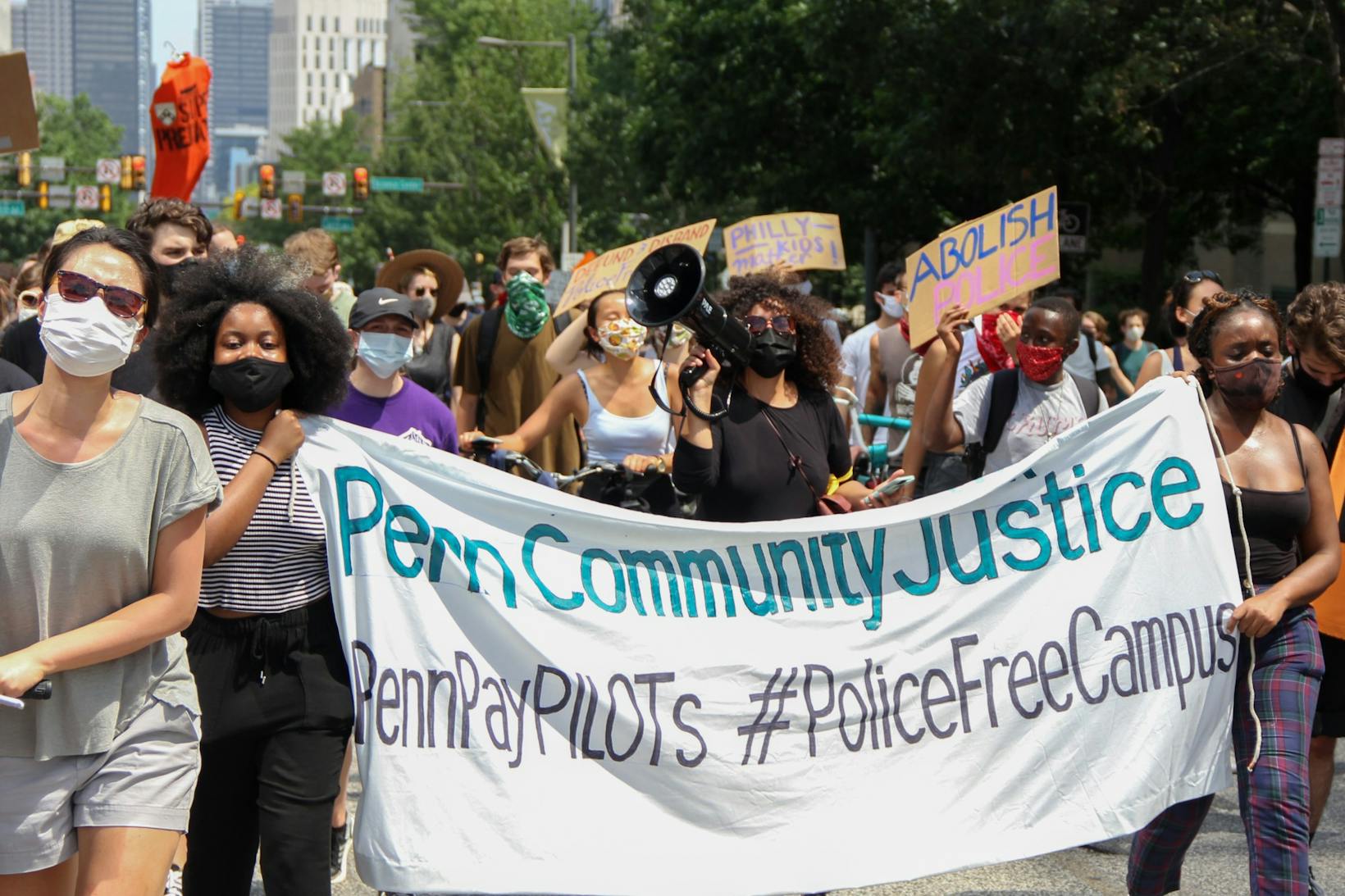 8-09-20 March on University City - Penn Community for Justice PILOTS Police Free Campus Sign.jpg