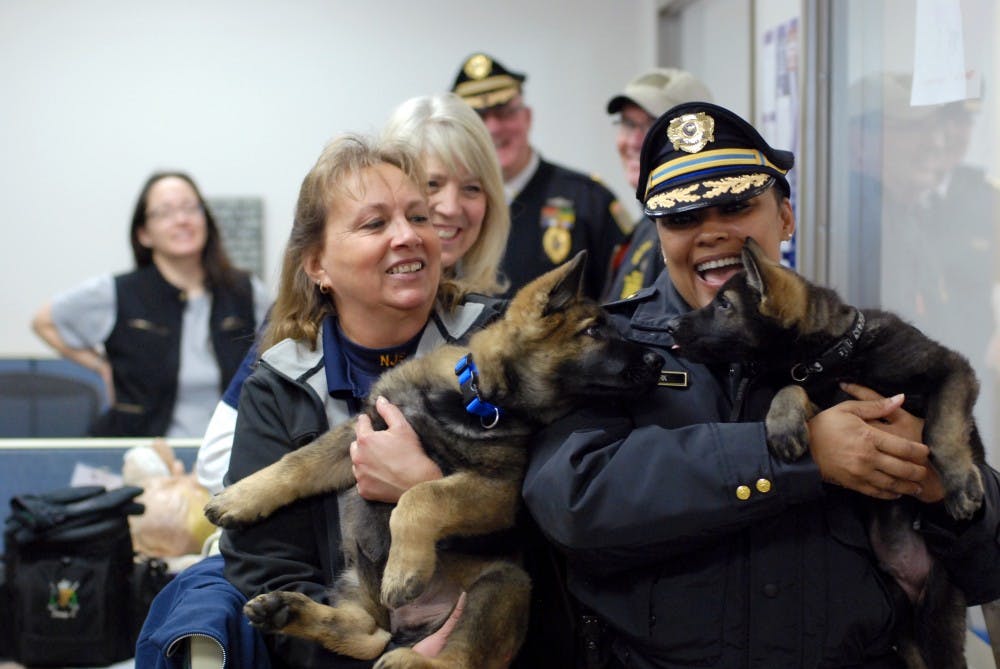 Septa police officers with the newest Penn Vet graduates. 